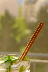 Close up image of lemonade with paper straws in it. Eco friendly concept.