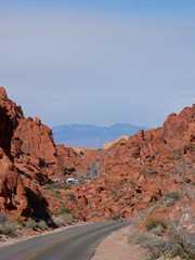 Roadway in the Valley of Fire State Park traversing rugged red rock outcroppings