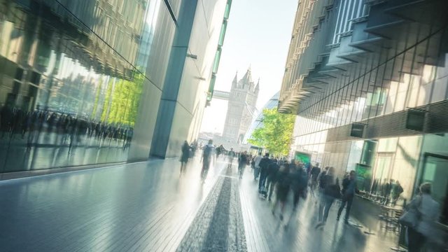 hyper lapse of modern buildings and Tower Bridge, London, UK
