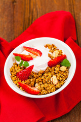 Strawberry Cinnamon Granola Yogurt Breakfast. Selective focus.