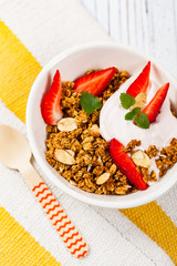 Strawberry Cinnamon Granola Yogurt Breakfast. Selective focus.