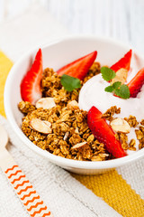 Strawberry Cinnamon Granola Yogurt Breakfast. Selective focus.