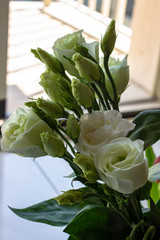 Naples, Italy 19 April 2019. Bouquet of flowers, white roses full of buds ready to bloom.