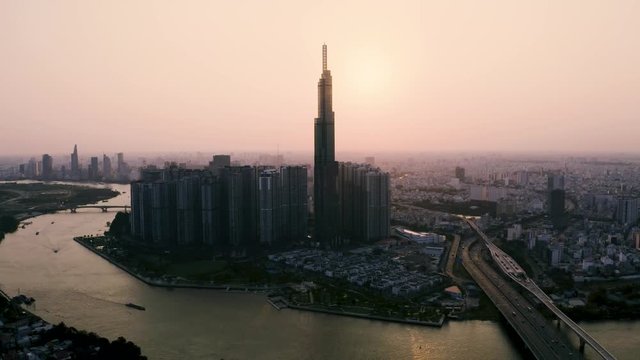 4k Aerial drone footage - Beautiful skyline of Saigon (Ho Chi Minh City) at sunset.  Vietnam, Asia