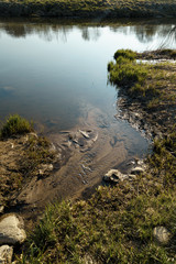 Canal joins a river in the city Sabile, Latvia