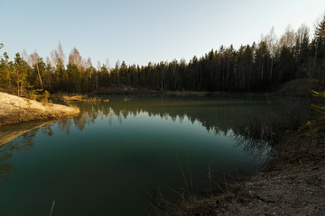Beautiful turquoise lake in Latvia - Meditirenian style colors in Baltic states - Lackroga ezers