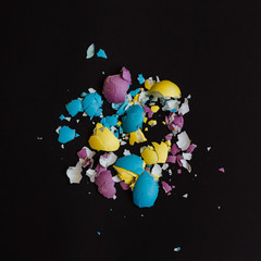 Colored eggshell on  black background