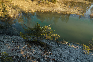 Beautiful turquoise lake in Latvia - Meditirenian style colors in Baltic states - Lackroga ezers