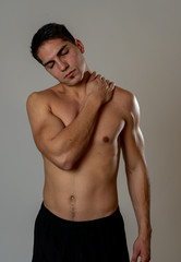 Obraz premium Strong young man suffering neck and cervical pain