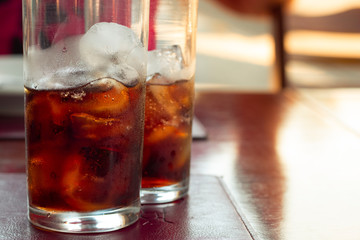 Soda with ice in a table restaurant