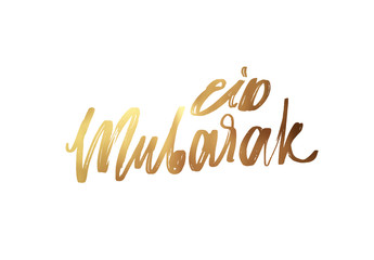 Eid mubarak. Text golden handwritten calligraphy.