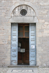 old wooden door in the wall