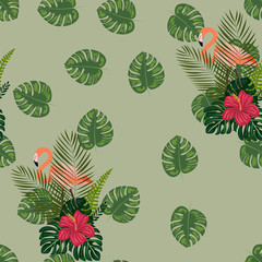 Flamingo with tropical flowers and leaves seamless pattern.