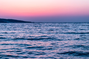 Fototapeta premium a wide landscape shoot of sea at sunset with awesome colors