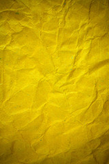 Texture crumpled yellow paper background.