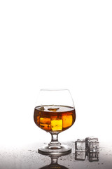 Whiskey with ice cubes.