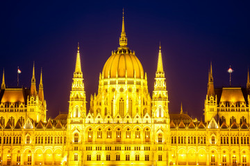 Fototapeta na wymiar Budapest's iconic Parliament building illuminated at twilight