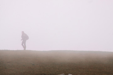 silhouette of man in desert