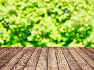 Products shelves and advertisements are wooden floors. The background is green from the nature of the tree (blurred image)