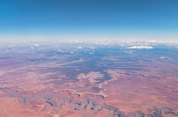 Aerial View of Large Canyons with Snowed PEak Mountain in the background