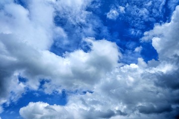White Clouds with Blue Sky Background.