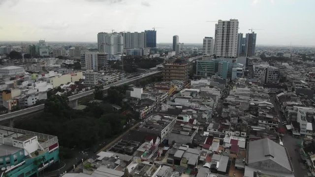 Flyby drone footage of downtown city of Medan in North Sumatra, Indonesia.