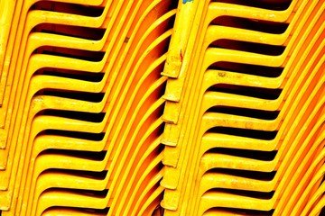 Close up, Old Yellow Plastic Chairs.