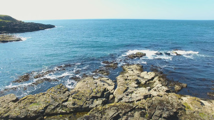 Fototapeta na wymiar Rocks Irish Sea Atlantic Ocean on coastline Giants Causeway Co. Antrim Northern Ireland