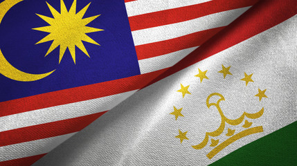 Fototapeta premium Malaysia and Tajikistan two flags textile cloth, fabric texture