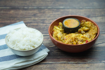 Traditional Thai style omelet with spicy chilli sauce