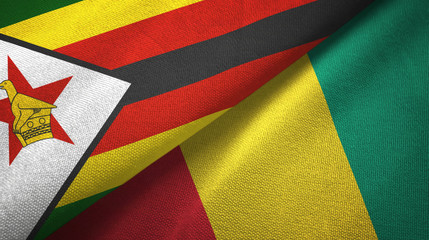 Fototapeta premium Zimbabwe and Guinea two flags textile cloth, fabric texture