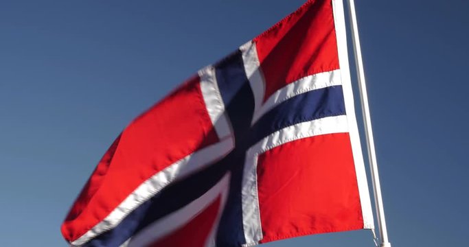 The Norwegian flag waving in the air