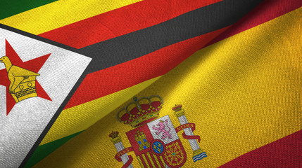 Zimbabwe and Spain two flags textile cloth, fabric texture