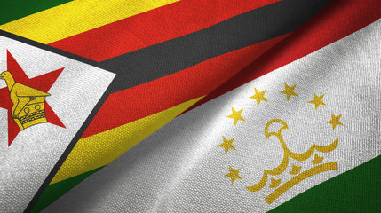 Fototapeta premium Zimbabwe and Tajikistan two flags textile cloth, fabric texture