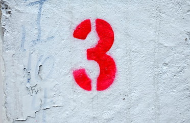 Three Number on Grunge Concrete Wall Texture Background.