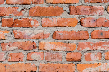 Wall sample from not a colored red brick. Ready photo background. Macro.