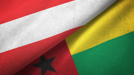 Austria and Guinea-Bissau two flags textile cloth, fabric texture