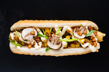 hot dog on the black background