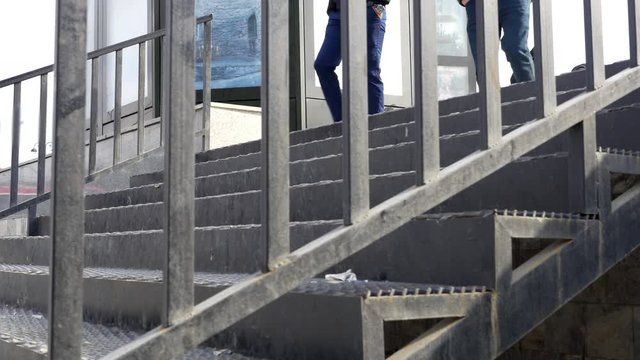 People Using Stairs For Pedestrians In A Busy City