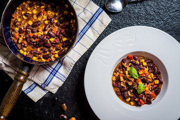Chili corn carne on stone table