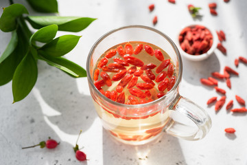 Goji Berry Tea In Glass Cup. Healthy Detox Weight Loss Superfood Drink