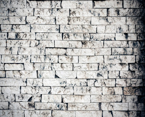 Old white dirty brick wall background.