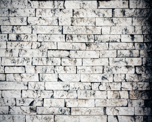 Old white dirty brick wall background.