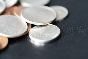 American cents on a dark surface close up