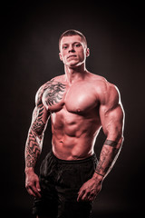 Fototapeta na wymiar portrait of a handsome muscular male bodybuilder