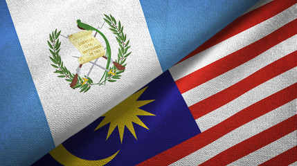 Guatemala and Malaysia two flags textile cloth, fabric texture