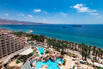 View on the central beach of Eilat - famous tourist resort and recreational city in Israel