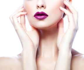 Fototapeta premium Woman beauty part of face, hands and body. Purple lips bright make-up, clean skin. Isolated. White background