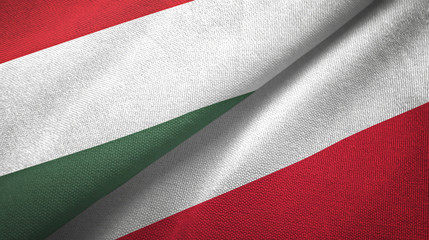 Hungary and Poland two flags textile cloth, fabric texture