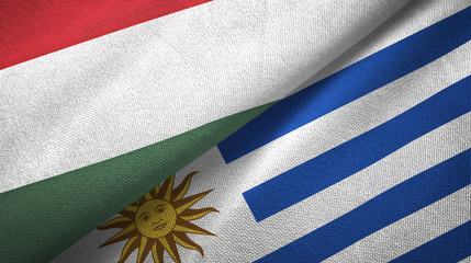 Hungary and Uruguay two flags textile cloth, fabric texture